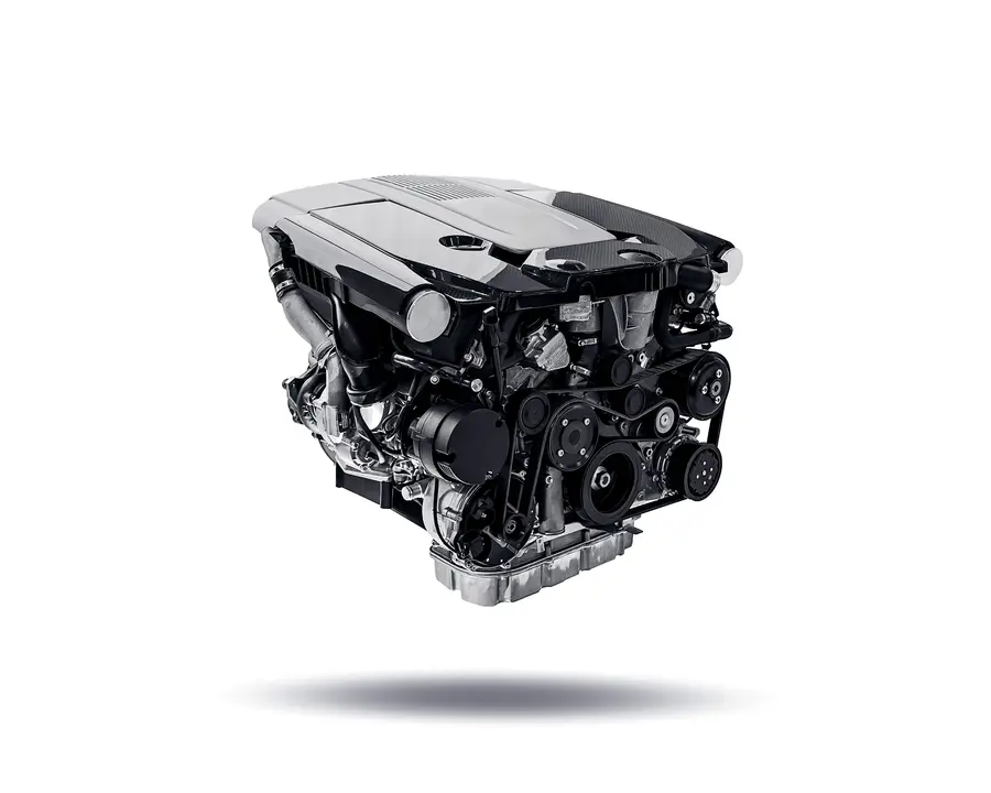 Complete automotive engine isolated on a white background