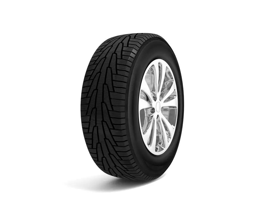 Vehicle tyre and rim isolated on a white background